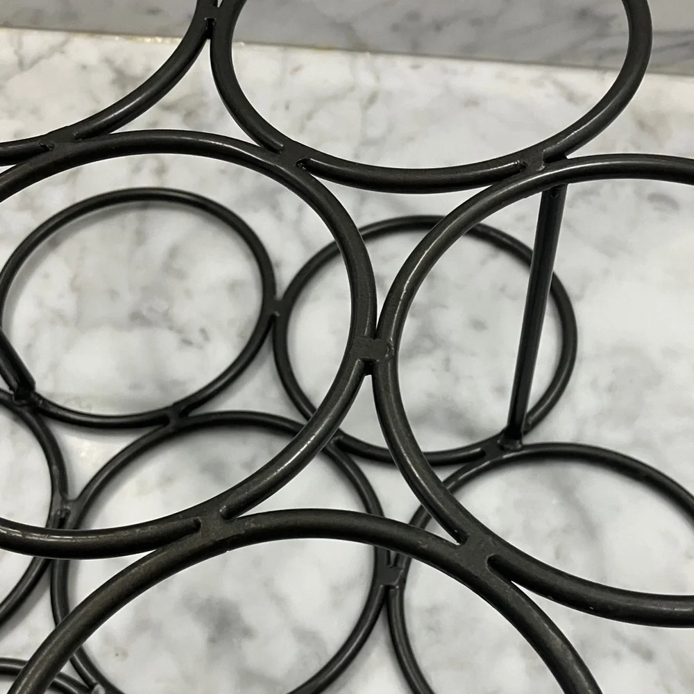 Gray Metal Wine Rack- 7 bottle, free standing, honeycomb style, circular, 4 legs